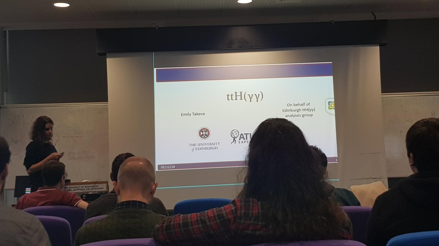 Emily presenting particle physics research